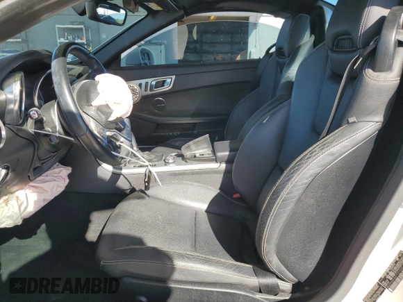 2015 Mercedes-Benz SLK 250 with VIN WDDPK4HAXFF099080, listed as a Copart auction lot 49264465 with 41,011 mi miles and Salvage title. Bid and sale history available at DreamBid. Image 7.