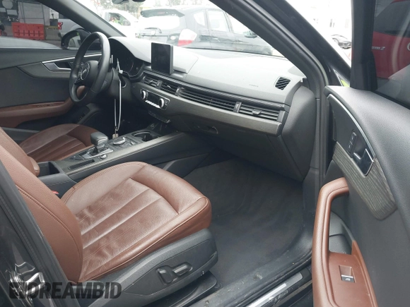 2019 Audi A4 Premium z VIN WAUGMAF44KA060327, wystawiony jako IAAI lot #41757099 z przebiegiem 52 110 mil mil oraz . Historia ofert i sprzedaży dostępna na DreamBid. Obrazek 5.