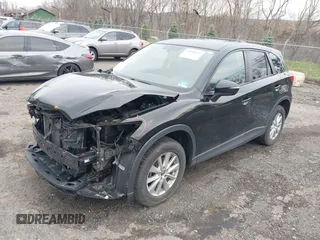 2016 Mazda CX-5 Touring with VIN JM3KE4CY4G0738713, listed as a IAAI auction lot 41998597 with 146,595 mi miles and . Bid and sale history available at carsss.com. Image 2.