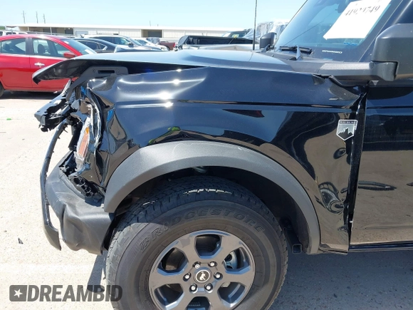 2024 Ford Bronco Big Bend z VIN 1FMDE7BH5RLA53797, wystawiony jako IAAI lot #41920749 z przebiegiem 13 399 mil mil oraz . Historia ofert i sprzedaży dostępna na DreamBid. Obrazek 6.