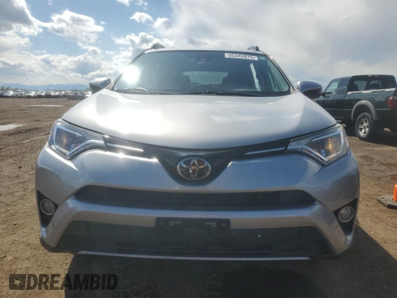 2018 Toyota RAV4 XLE with VIN 2T3RFREV2JW699448, listed as a Copart auction lot 55345975 with 46,437 mi miles and Salvage Title. Bid and sale history available at DreamBid. Image 5.