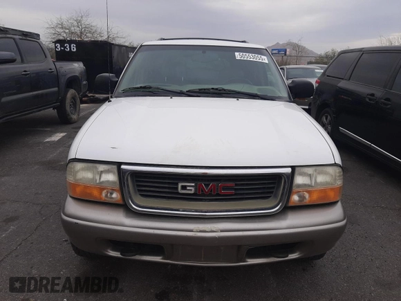 1999 GMC Jimmy SLE with VIN 1GKDT13W1X2551085, listed as a Copart auction lot 50553055 with 189,974 mi miles and Salvage Title. Bid and sale history available at carsss.com. Image 5.