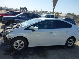 2015 Toyota Prius Four with VIN JTDKN3DU4F1977363, listed as a IAAI auction lot 42283570 with 185,992 mi miles and . Bid and sale history available at DreamBid. Image 14.