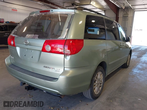 2008 Toyota Sienna LE with VIN 5TDBK23C88S020607, listed as a IAAI auction lot 41748033 with 159,439 mi miles and . Bid and sale history available at DreamBid. Image 4.