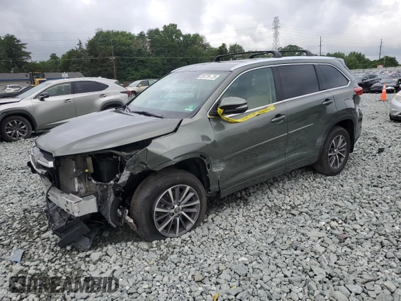 2018 Toyota Highlander SE with VIN 5TDJZRFH8JS888491, listed as a Copart auction lot 61197555 with Not provided miles and Salvage title. Bid and sale history available at DreamBid. Image 1.