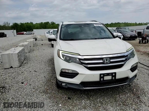2016 Honda Pilot Touring with VIN 5FNYF6H92GB057531, listed as a Copart auction lot 54354145 with 86,806 mi miles and Salvage Title. Bid and sale history available at DreamBid. Image 14.