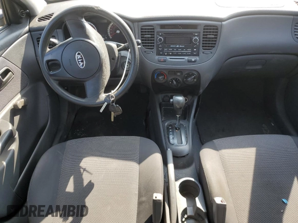 2011 Kia Rio with VIN KNADH4B38B6725531, listed as a Copart auction lot 72389974 with 124,315 mi miles and Salvage Title. Bid and sale history available at DreamBid. Image 8.