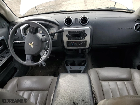 2007 Mitsubishi Raider LS with VIN 1Z7HT28K67S217597, listed as a Copart auction lot 79767304 with 110743 miles and Salvage Title. Bid and sale history available at carsss.com. Image 8.