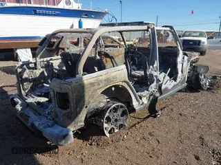 2023 Jeep Wrangler Rubicon with VIN 1C4JJXR63PW557655, listed as a IAAI auction lot 40857194 with Not provided miles and . Bid and sale history available at DreamBid. Image 4.