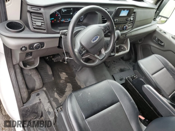 2023 Ford Transit Cargo с VIN 1FTBR1C87PKA31959, выставлен на аукционе Copart как лот 51645315 с пробегом 39 150 миль миль и На запчасти • Non repairable. История ставок и продаж доступна на DreamBid. Изображение 8.