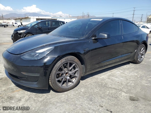 2021 Tesla Model 3 Standard Range Plus with VIN 5YJ3E1EAXMF069467, listed as a Copart auction lot 63273134 with 66,393 mi miles and Salvage Title. Bid and sale history available at carsss.com. Image 1.