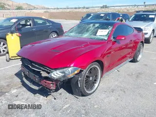 2019 Ford Mustang GT z VIN 1FA6P8CF1K5169685, wystawiony jako IAAI lot #42087297 z przebiegiem 76 612 mil mil oraz . Historia ofert i sprzedaży dostępna na DreamBid. Obrazek 18.