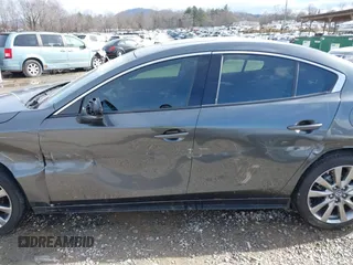 2023 Mazda 3 S Premium with VIN 3MZBPBDM8PM373434, listed as a IAAI auction lot 41234729 with 9,387 mi miles and . Bid and sale history available at DreamBid. Image 14.