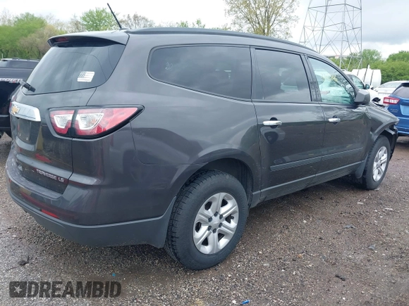 2015 Chevrolet Traverse LS z VIN 1GNKRFKDXFJ107942, wystawiony jako IAAI lot #42111246 z przebiegiem 128 036 mil mil oraz . Historia ofert i sprzedaży dostępna na DreamBid. Obrazek 4.