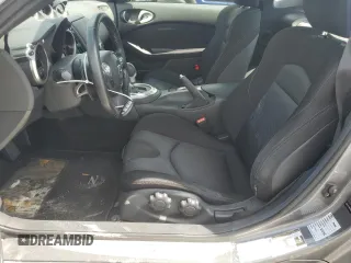 2014 Nissan 370Z with VIN JN1AZ4EH6EM633797, listed as a Copart auction lot 74027354 with Not Provided miles and Salvage Title. Bid and sale history available at DreamBid. Image 7.