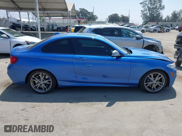 2014 BMW 2 Series M235i with VIN WBA1J7C52EVW84588, listed as a IAAI auction lot 42490194 with 103,998 mi miles and . Bid and sale history available at DreamBid. Image 13.