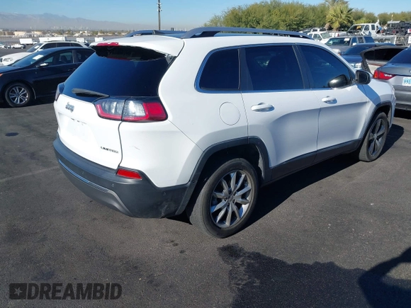2020 Jeep Cherokee Limited with VIN 1C4PJLDBXLD536346, listed as a IAAI auction lot 41164017 with 35,057 mi miles. Bid and sale history available at carsss.com. Image 4.