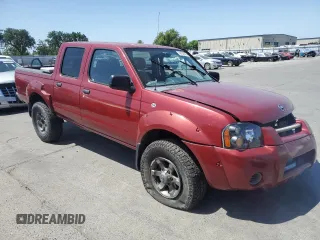 2004 Nissan Frontier XE z VIN 1N6ED27Y04C429769, wystawiony jako Copart lot #56164285 z przebiegiem 214 583 mil mil oraz Szkody całkowita. Historia ofert i sprzedaży dostępna na DreamBid. Obrazek 4.