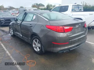 2015 Kia Optima LX with VIN 5XXGM4A72FG400848, listed as a IAAI auction lot 40802198 with 173,270 mi miles and . Bid and sale history available at DreamBid. Image 3.
