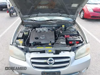 2003 Nissan Maxima SE with VIN JN1DA31D33T513282, listed as a IAAI auction lot 42289710 with 343,973 mi miles and . Bid and sale history available at DreamBid. Image 10.
