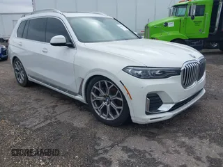 2019 BMW X7 xDrive40i z VIN 5UXCW2C53KL083874, wystawiony jako IAAI lot #41280522 z przebiegiem 155 067 mil mil oraz . Historia ofert i sprzedaży dostępna na DreamBid. Obrazek 1.