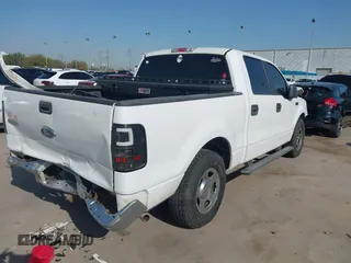 2006 Ford F-150 XLT with VIN 1FTPW12V16FB40883, listed as a IAAI auction lot 41839435 with 196,952 mi miles. Bid and sale history available at carsss.com. Image 4.