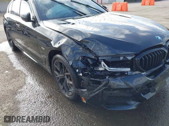 2023 BMW 5 Series 530e with VIN WBA13AG09PCL56556, listed as a IAAI auction lot 42098427 with Not provided miles and . Bid and sale history available at DreamBid. Image 6.