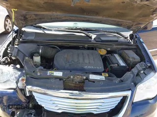 2014 Chrysler Town & Country Touring with VIN 2C4RC1BGXER131707, listed as a IAAI auction lot 42017348 with 120,790 mi miles and . Bid and sale history available at DreamBid. Image 10.