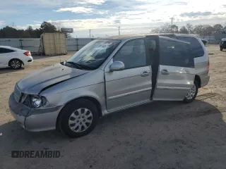 2005 Kia Sedona LX with VIN KNDUP132X56721558, listed as a Copart auction lot 88574685 with 176,660 mi miles and Salvage Title. Bid and sale history available at carsss.com. Image 1.