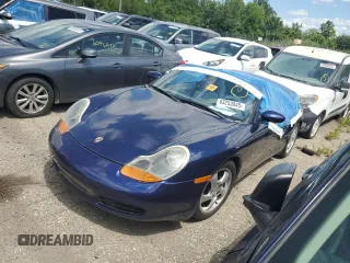 2001 Porsche Boxster with VIN WP0CA29801U620937, listed as a Copart auction lot 63253845 with 131,559 mi miles and Salvage title. Bid and sale history available at DreamBid. Image 1.
