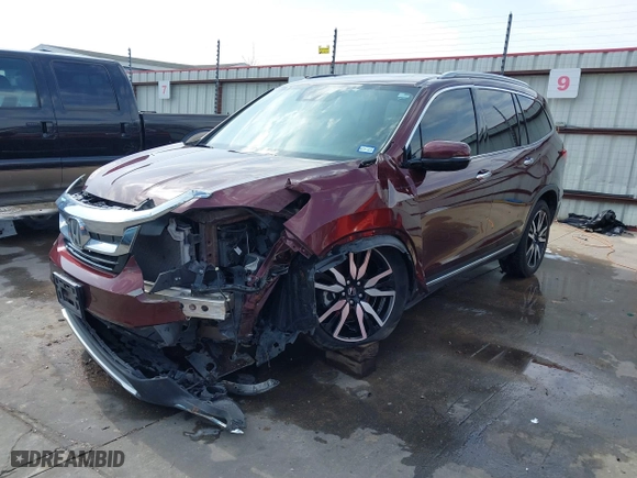 2019 Honda Pilot Touring 8-Passenger with VIN 5FNYF5H95KB009122, listed as a IAAI auction lot 41573338 with 85,845 mi miles. Bid and sale history available at carsss.com. Image 23.