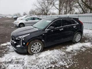 2023 Cadillac XT4 FWD Luxury z VIN 1GYAZAR40PF168776, wystawiony jako Copart lot #50130855 z przebiegiem 67 048 mil mil oraz Czysty tytuł • Clean title. Historia ofert i sprzedaży dostępna na DreamBid. Obrazek 1.