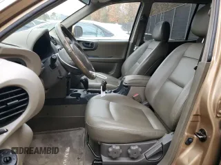 2001 Hyundai Santa Fe GLS with VIN KM8SC83D71U084837, listed as a Copart auction lot 77588984 with 102,585 mi miles and Salvage Title. Bid and sale history available at carsss.com. Image 7.