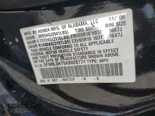 2010 Honda Odyssey EX-L with VIN 5FNRL3H79AB028724, listed as a IAAI auction lot 41687998 with 221,852 mi miles. Bid and sale history available at carsss.com. Image 9.