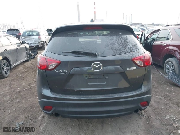 2016 Mazda CX-5 Grand Touring with VIN JM3KE4DYXG0684638, listed as a IAAI auction lot 41101563 with NaN miles. Bid and sale history available at carsss.com. Image 16.
