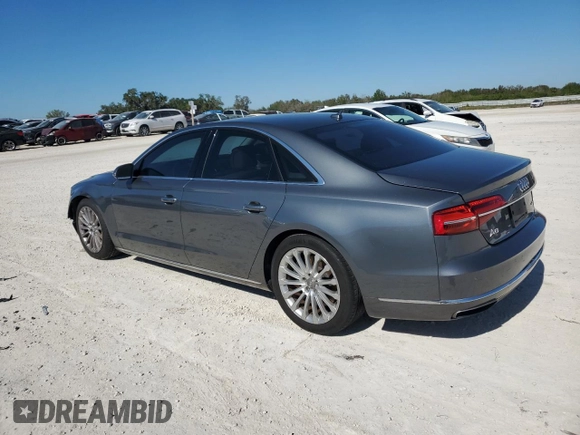 2015 Audi A8 with VIN WAUJGAFD5FN009026, listed as a Copart auction lot 81938904 with 122,880 mi miles and Salvage title. Bid and sale history available at DreamBid. Image 2.