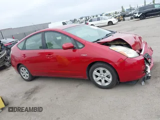 2007 Toyota Prius z VIN JTDKB20U673288178, wystawiony jako IAAI lot #42362578 z przebiegiem 104 388 mil mil oraz . Historia ofert i sprzedaży dostępna na DreamBid. Obrazek 13.