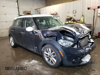 2012 MINI Countryman S with VIN WMWZC5C57CWM14796, listed as a Copart auction lot 43021345 with 178,183 mi miles and Salvage Title. Bid and sale history available at DreamBid. Image 4.