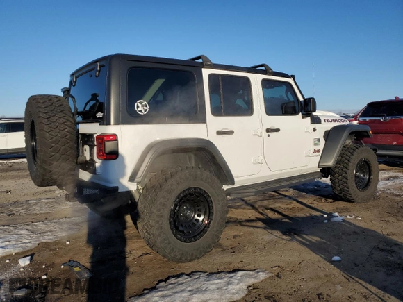 2018 Jeep Wrangler Unlimited Rubicon with VIN 1C4HJXFG8JW104425, listed as a Copart auction lot 87545965 with 62,988 mi miles and Salvage title. Bid and sale history available at DreamBid. Image 3.