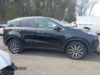 2017 Kia Sportage EX z VIN KNDPNCAC9H7152016, wystawiony jako IAAI lot #42082483 z przebiegiem 87 539 mil mil oraz . Historia ofert i sprzedaży dostępna na DreamBid. Obrazek 13.