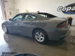 2023 Dodge Charger SXT with VIN 2C3CDXBG2PH587879, listed as a Copart auction lot 54262165 with 60,663 mi miles and Salvage Title. Bid and sale history available at carsss.com. Image 2.