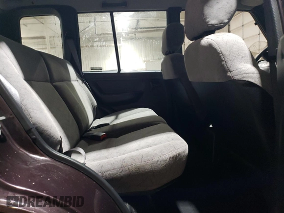 1998 Chevrolet Tracker z VIN 2CNBJ1362W6919635, wystawiony jako Copart lot #56894355 z przebiegiem 140 298 mil mil oraz Szkoda całkowita • Salvage title. Historia ofert i sprzedaży dostępna na DreamBid. Obrazek 11.