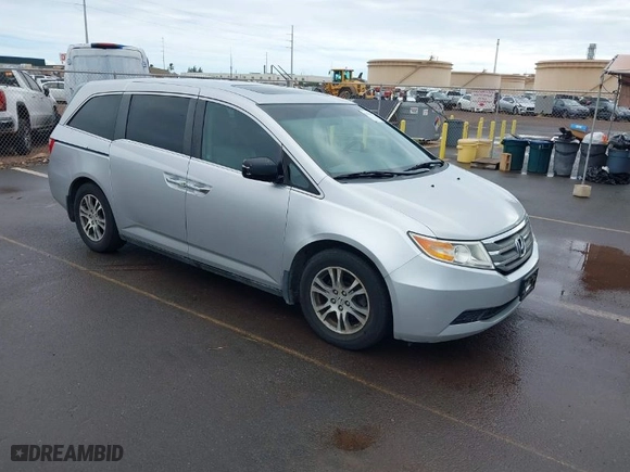 2012 Honda Odyssey EX-L with VIN 5FNRL5H68CB056567, listed as a IAAI auction lot 41014382 with 101,885 mi miles. Bid and sale history available at carsss.com. Image 1.