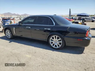 2009 Jaguar XJ 8 with VIN SAJWA71B79SH30431, listed as a Copart auction lot 52403185 with 67,143 mi miles and Salvage Title. Bid and sale history available at DreamBid. Image 2.