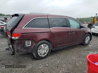 2014 Honda Odyssey LX z VIN 5FNRL5H24EB098072, wystawiony jako Copart lot #57577385 z przebiegiem 215 069 mil mil oraz Szkoda całkowita • Salvage title. Historia ofert i sprzedaży dostępna na DreamBid. Obrazek 3.
