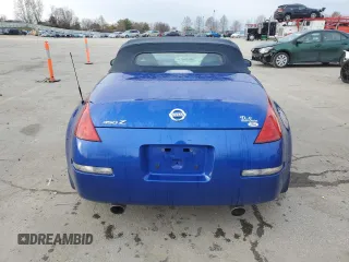 2004 Nissan 350Z Touring with VIN JN1AZ36A24T002058, listed as a Copart auction lot 87305154 with 61,000 mi miles and Salvage Title. Bid and sale history available at carsss.com. Image 6.