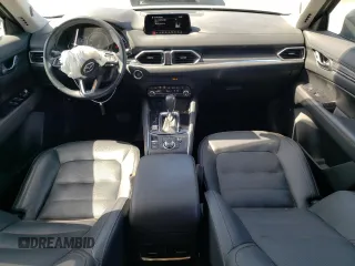 2019 Mazda CX-5 Grand Touring with VIN JM3KFADM6K1641992, listed as a Copart auction lot 57862345 with 37,100 mi miles and Salvage title. Bid and sale history available at DreamBid. Image 8.