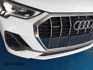2023 Audi Q3 S line Premium with VIN WA1DECF34P1100929, listed as a IAAI auction lot 42752537 with 52,586 mi miles and . Bid and sale history available at DreamBid. Image 1.