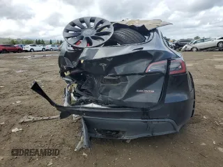 2022 Tesla Model Y Performance with VIN 7SAYGDEF1NF404133, listed as a Copart auction lot 51108165 with 44,102 mi miles and Salvage Title. Bid and sale history available at DreamBid. Image 6.