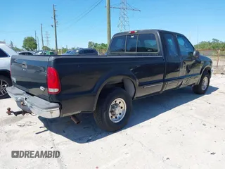 1999 Ford F-250 XL with VIN 1FTNX20LXXEA49775, listed as a IAAI auction lot 41825626 with 141,767 mi miles and . Bid and sale history available at DreamBid. Image 4.